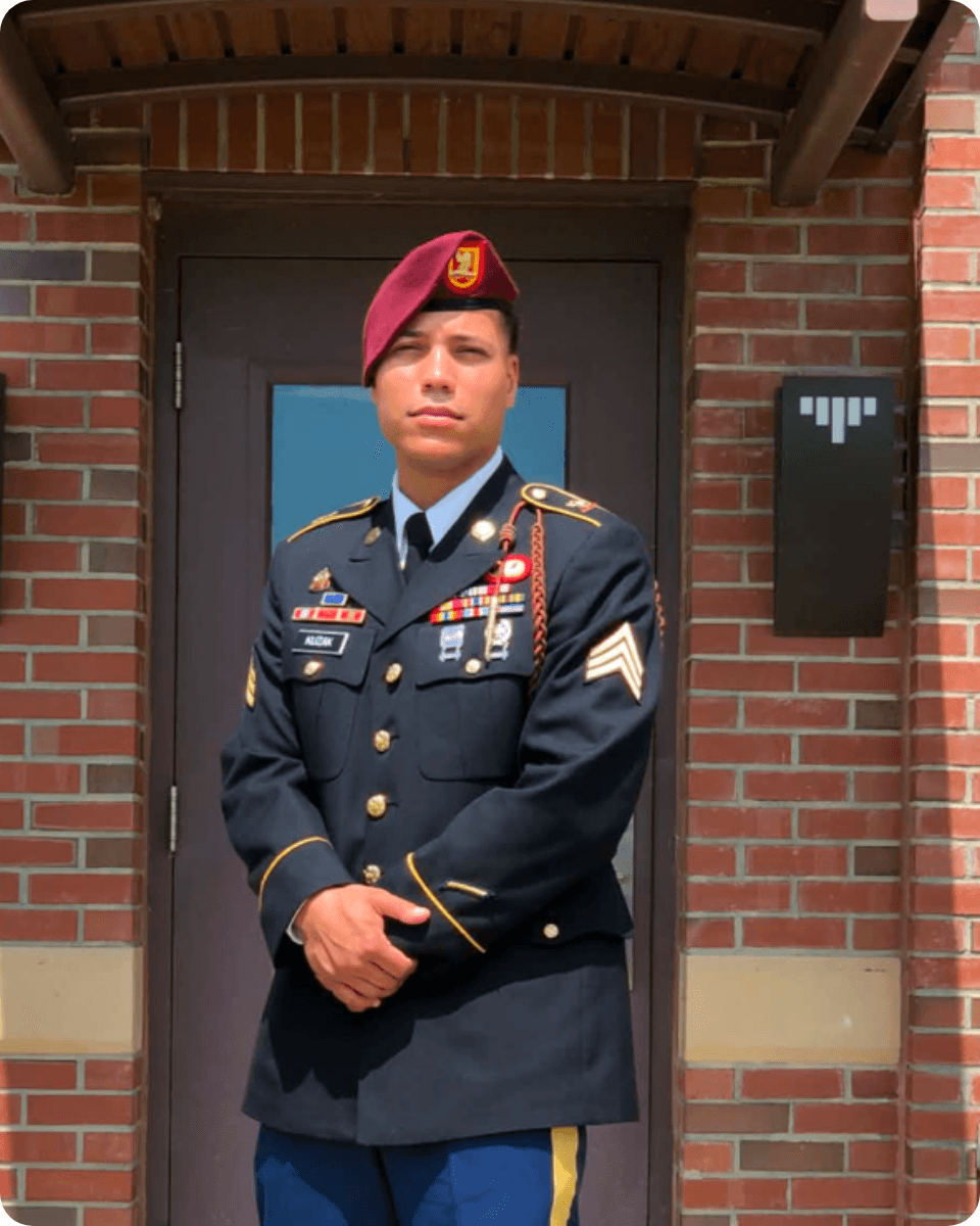Clinton, U.S. Army veteran, in dress uniform.